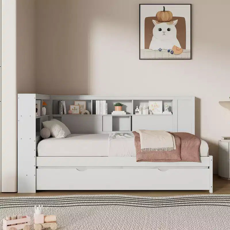 Letto a giorno gemello a L con letto estraibile, mensole a libreria e porta USB